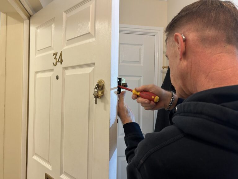 Home Locksmith fitting a lock